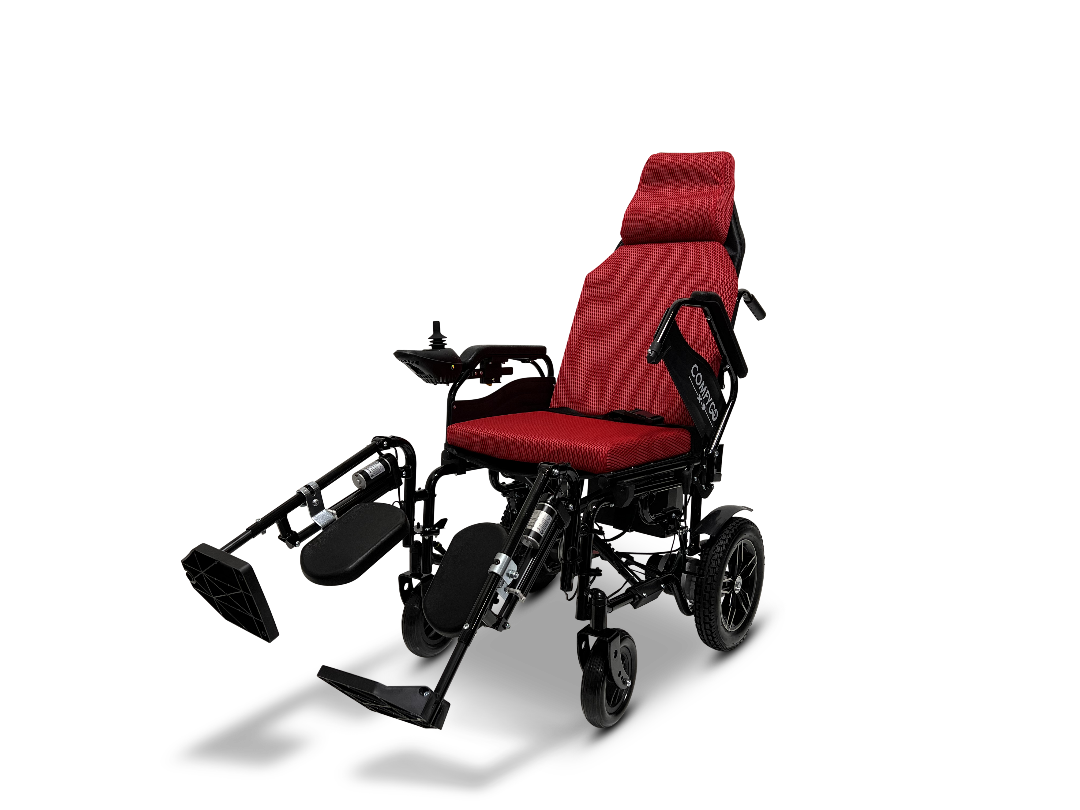 The ComfyGo X-9 Remote Controlled Powerchair, featuring an automatic reclining backrest and leg supports, boasts a red and black design. It includes a cushioned seat, small front wheels, larger rear wheels, and an armrest-mounted joystick for navigation.